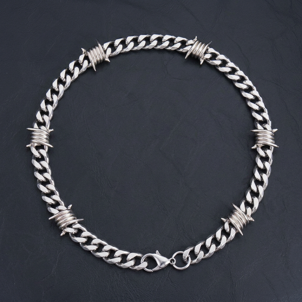 9mm Snare Chain laid flat on dark ground, lobster clasp detail